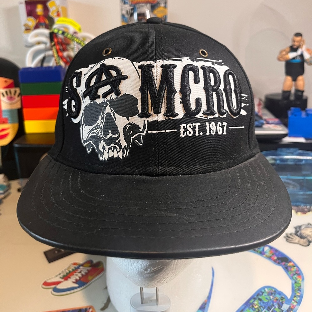 Sons of Anarchy" (SAMCRO) hat.